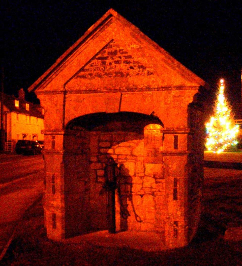 The public water pump and Christmas tree opposite the Parish Hall