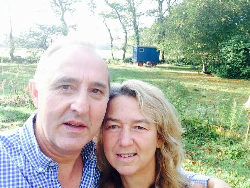 Tony and Jenny with the Shepherds Hut in the background